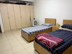 Sharing accommodation in a villa in Mirdif