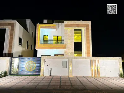 Villa for sale in Ajman, 4 bedrooms, price includes registration fees, very good finishing, freehold ownership for all nationalities, and bank financi