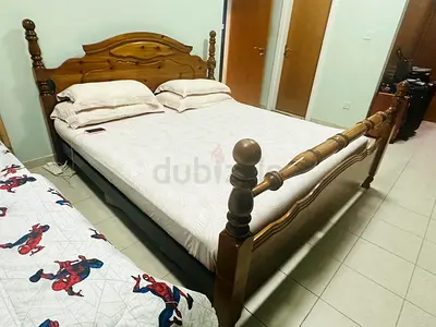 Sold wood Bed with dressing table and side tables