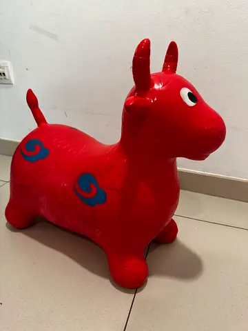 My red Rody-style hopper ride-on toy