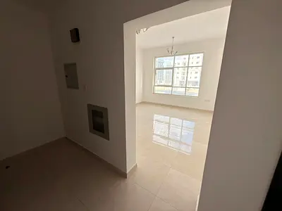 ثاني ساكن بناية جديدة بموقع مميز جدا علي مخرج دبي مباشرة مع بلكونة و 2 حمام وغرفة ماستر باطلالة بانورامية جذابة وسعر اقتصادي