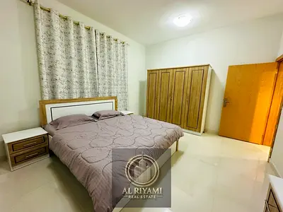 Furnished two-bedroom apartment for rent on Ajman Corniche, prime tourist location