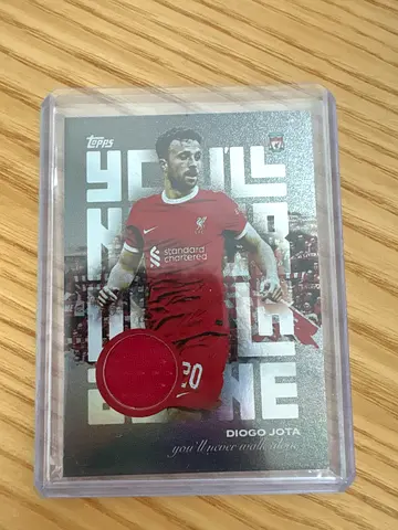 Topps soccer trading card with red jersey swatch patch