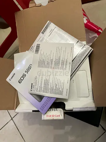 Canon EOS 500D DSLR with original box and manuals