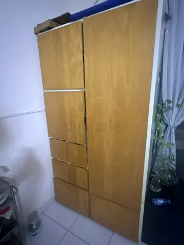 Wooden wardrobe with built-in drawers - used, good condition with minor scratches because of use.