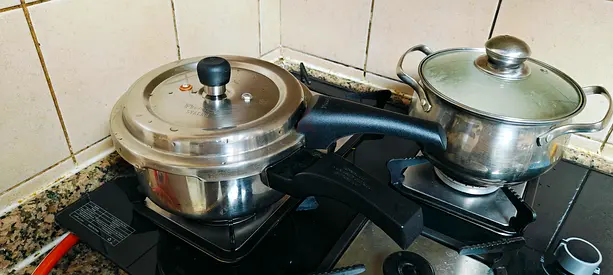 Used prestige stainless steel cooking pots — 2-piece set