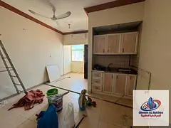The most beautiful and largest studio , featuring a spacious side kitchen , built-in wardrobes , and