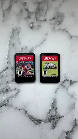 Two Nintendo switch game cards