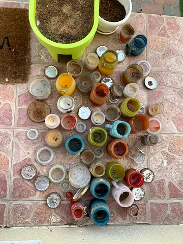 Used candles in jars