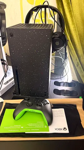 Xbox Series X console with 2 controllers and cooling stand