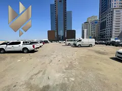 Parking land for rent in Al Nahda Sharjah on main road corner prime location great price investment