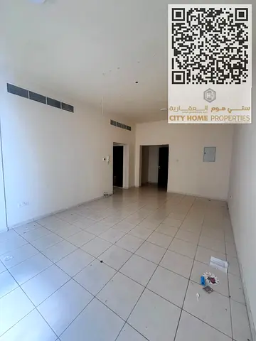 استوديو للإيجار السنوي في البستان عجمان بمساحة كبيرة جداً وتشطيب نظيف تكييف مركزي + بلكونة + مطبخ منفصل بباب لخصوصية أفضل سعر مميز 23,000 درهم فقط مع
