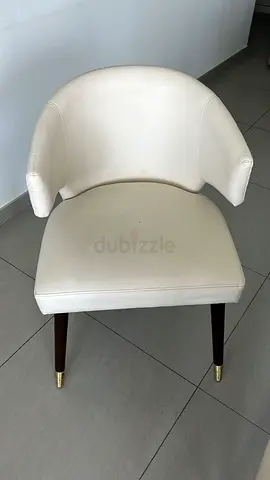 4 beige leather chairs