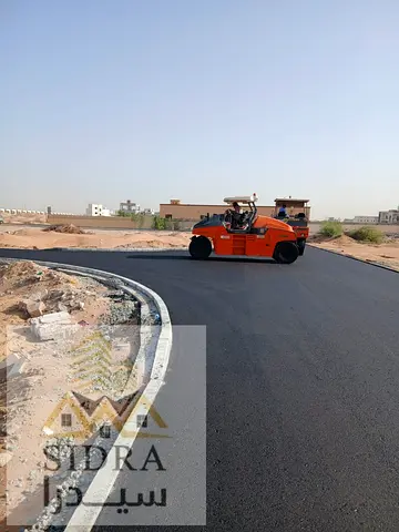 For sale: Residential and commercial land in Al Liwara, permitted for ground floor + two floors, with potential for additional expansion.