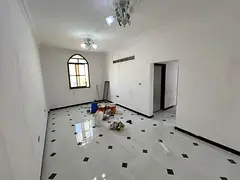 Two luxurious bedrooms and a living room in Al Rawda 3 - Central air conditioning - Free maintenance