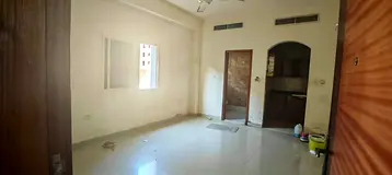 Studio apartment in Al-Aliya, Ajman, with central air conditioning, suitable for families, and featu