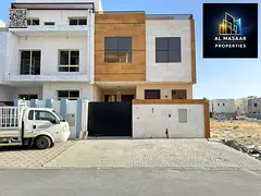 For sale in Ajman, Al Helio 2 area: a villa consisting of 4 master bedrooms, a majlis (formal sittin
