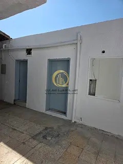 For sale: a corner house on two paved streets in Al-Hazzanah, in the Sharqah building. Prime locatio