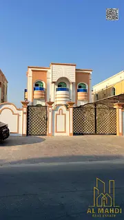 A villa is available for sale in the heart of Ajman, Al Rawda 3 area. This stunning villa features f