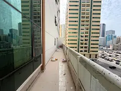 "Beautiful 2-bedroom apartment with a living room in Al Majaz 2, featuring a very large terrace