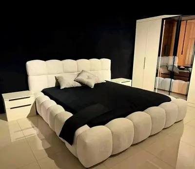 Modern cream upholstered king bed (good condition)