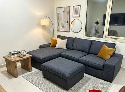 Stylish Lounge Sofa Set – Perfect combination of comfort and modern design with matching ottoman.