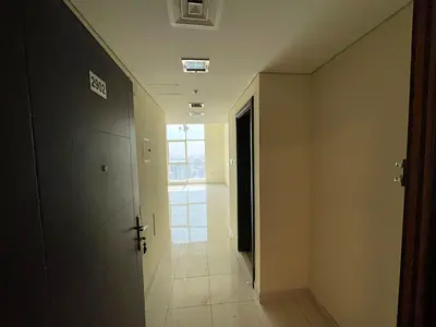 Free parking + gym, pool & kids area | 1BR, hall, 2 baths, built-in wardrobes | Open view of Al Qasba Canal