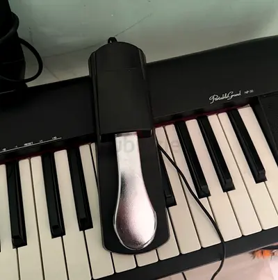 Yamaha.    Np-30 piano