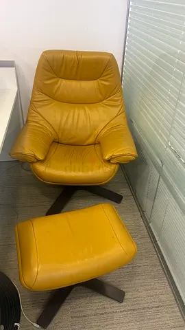 My leather swivel lounge chair with ottoman (mustard yellow)