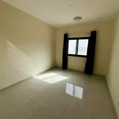 2 rooms and a hall _ Al-Jarf 3 _ 2 bathrooms _ Central air conditioning _ Parquet floor _ Large area