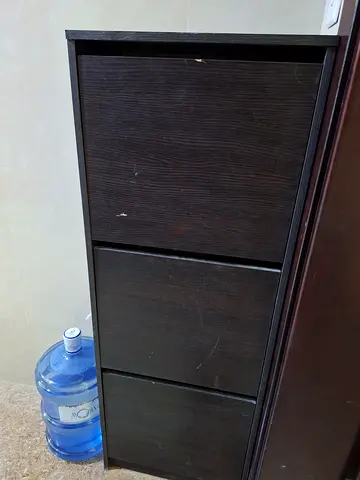 Dark brown 3-row shoe rack used