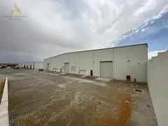 Spacious Industrial Warehouse with Prime Main Road Access | Al Sajaa