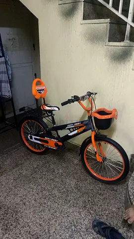 My childs black  orange kids bike (good condition)
