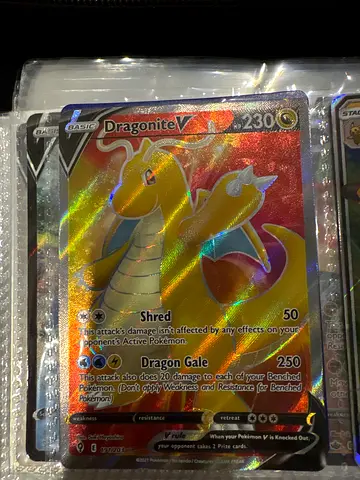 Pokémon TCG Dragonite V Rainbow Holo — kept sleeved