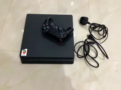 Sony PS4 Slim with DualShock 4 and Cables (Working)