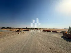 Commercial land for sale in Al Blida 2, prime location on Maliha Road, special price, freehold for A