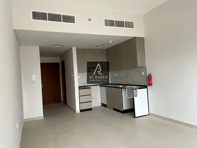 Studio apartment in Garden Residence with balcony, pool, gym, and free parking.