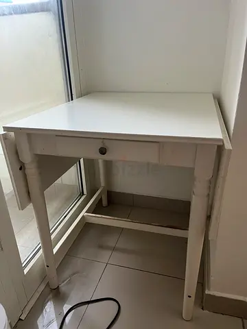 White wooden single-drawer writing desk