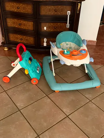 Light blue baby walker with push walker - good condition