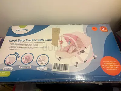 Coral baby rocker with canopy (Juniors) - new still in box
