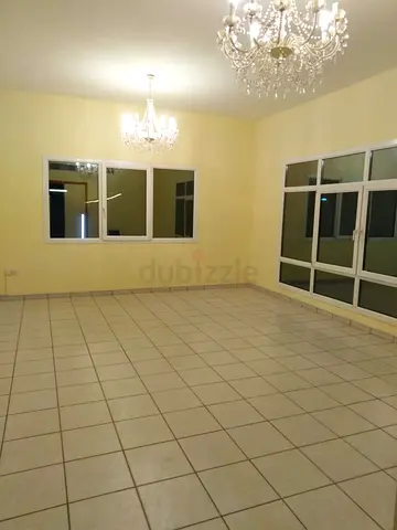 Spacious, neat, and well-maintained room available in a villa, offering a comfortable environment.