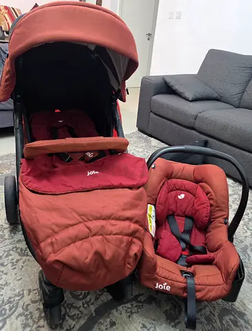 My Joie travel system — stroller + infant car seat (rust/maroon)