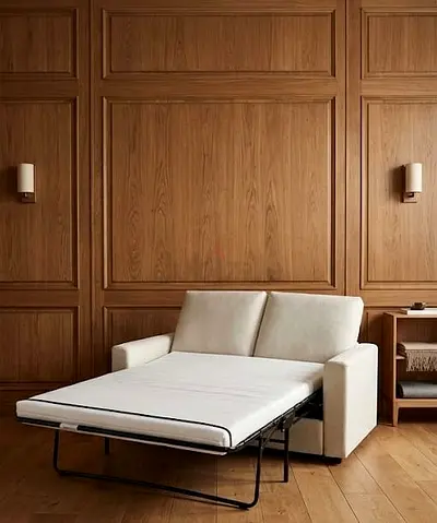 Beige 2-seater pull-out sofa bed — good condition