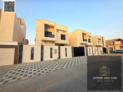 Luxury brand-new villa with 5 master bedrooms, very large living room, 2 kitchens, 7 bathrooms, maid room, storage room, and a very large yard. Full m