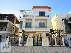 A neoclassical villa with 6 bedrooms, modern finishes, a prime location, ground floor, first floor,