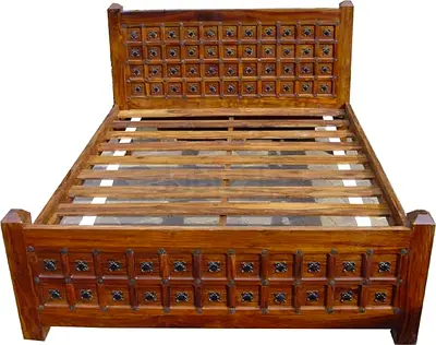 Solid wooden bed frame with carved headboard and footboard