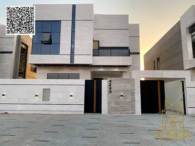 Luxury villa in Al Helio 2, Ajman, ready for immediate occupancy with high-end finishes and spacious living areas. Freehold ownership for all national