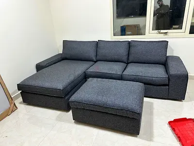 Modern L-Shape Sofa Set – Stylish dark grey fabric with spacious seating, perfect for modern homes.
