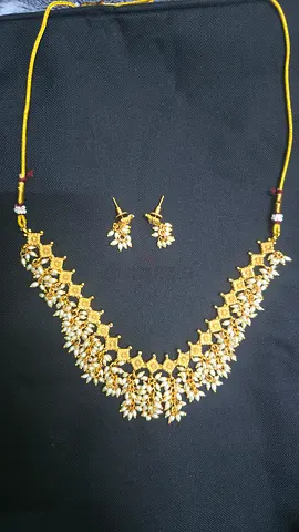 Traditional gold-color necklace set with matching earrings — new