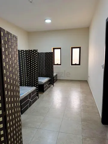 NEXT TO BUS STOP EXECUTIVE BED SPACE IN SILICON OASIS